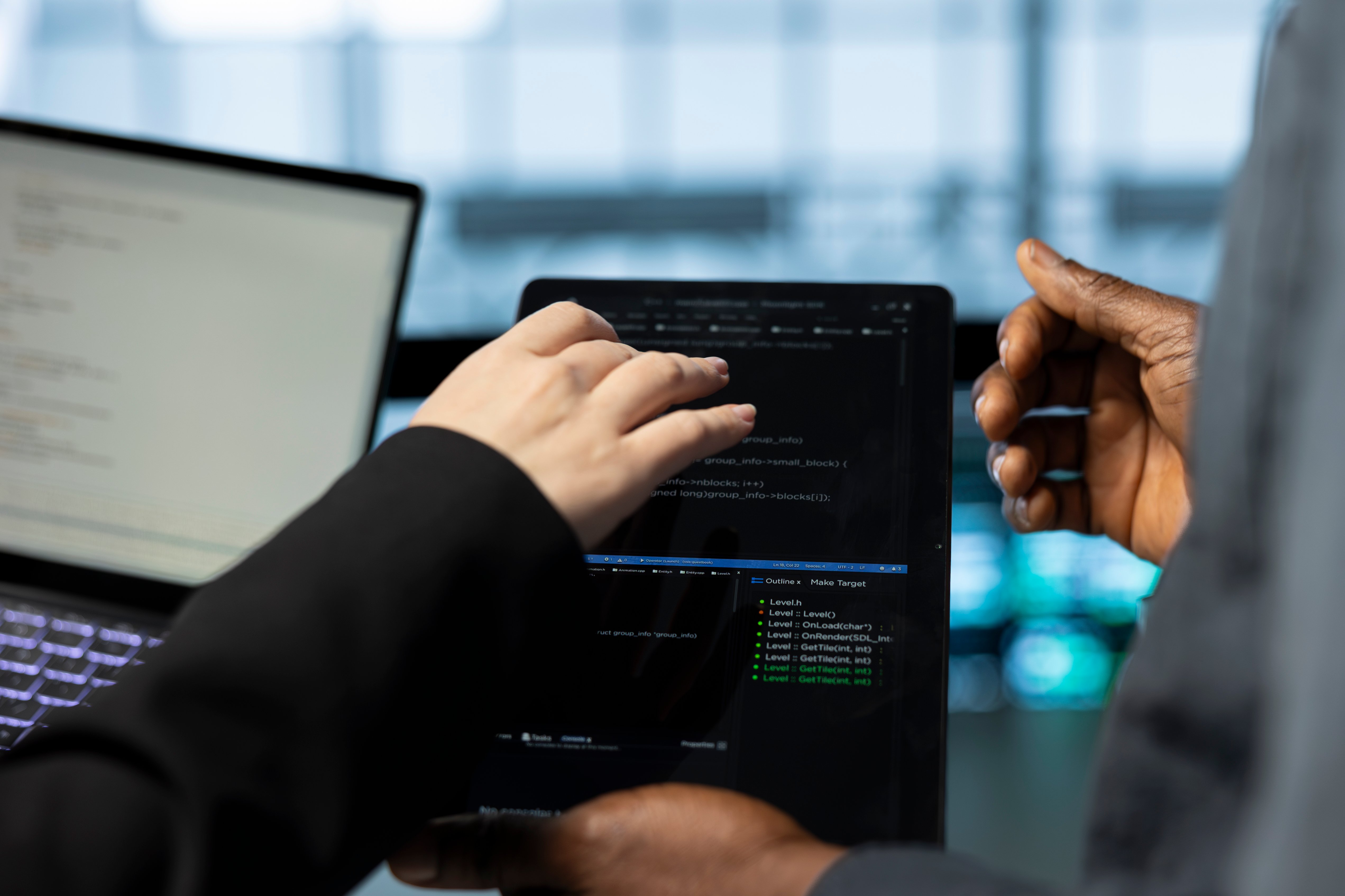 close-up-data-center-employees-using-devices-fulfill-infrastructure-needs